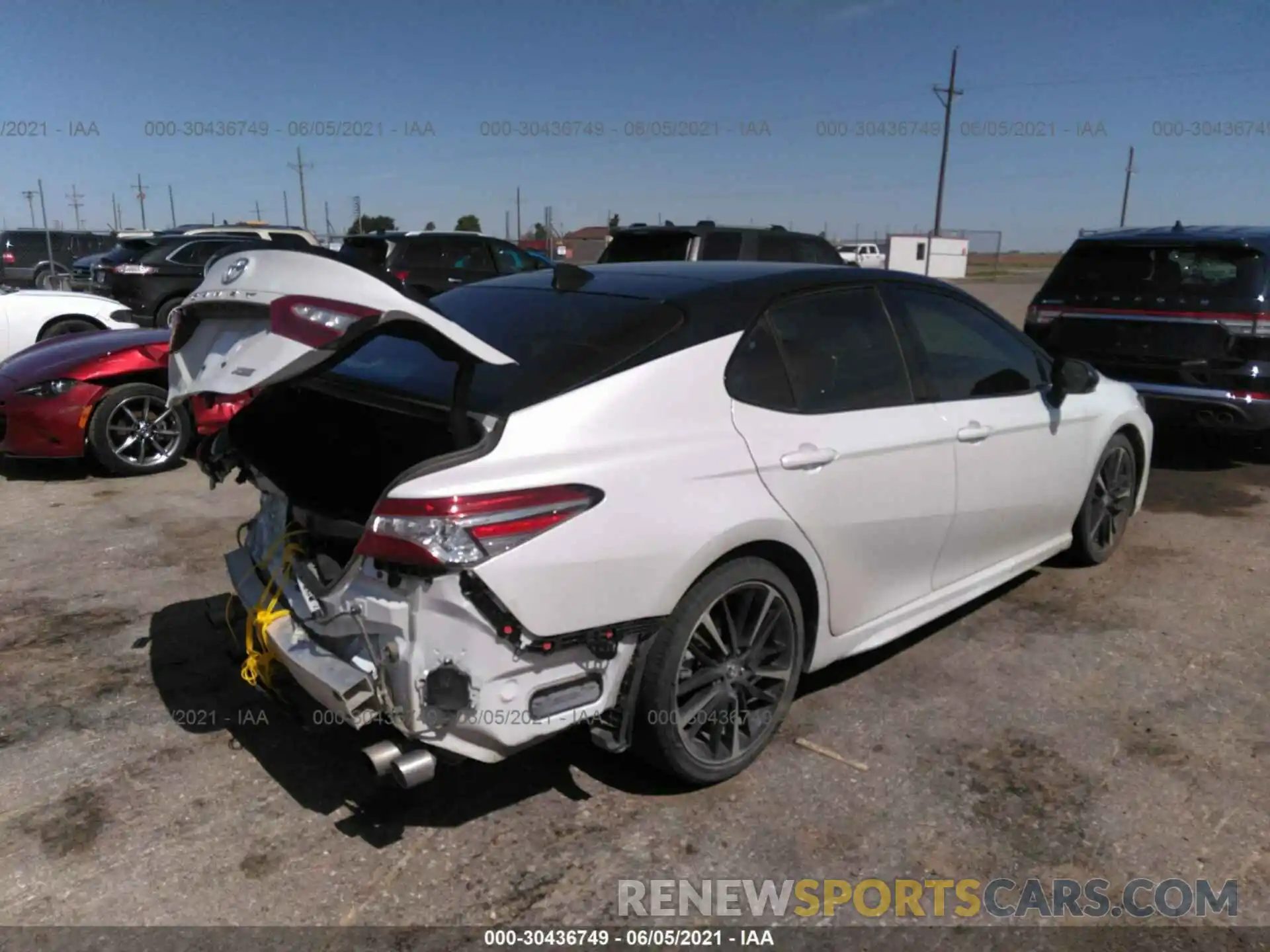 4 Photograph of a damaged car 4T1BZ1HK0KU030021 TOYOTA CAMRY 2019