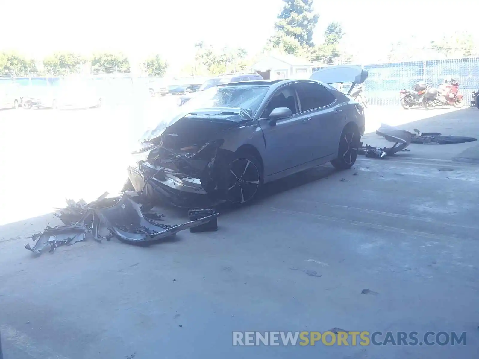 2 Photograph of a damaged car 4T1BZ1HK0KU030780 TOYOTA CAMRY 2019