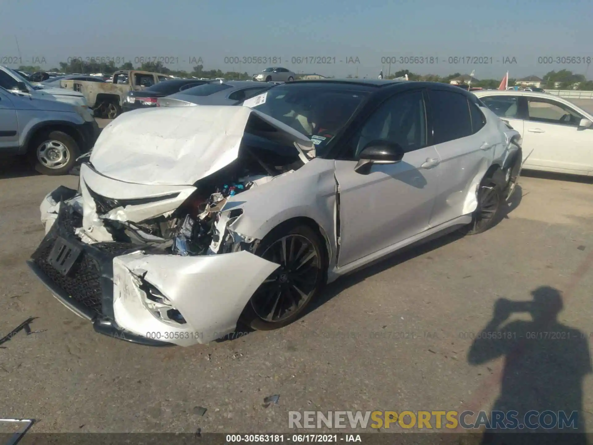 2 Photograph of a damaged car 4T1BZ1HK0KU031282 TOYOTA CAMRY 2019