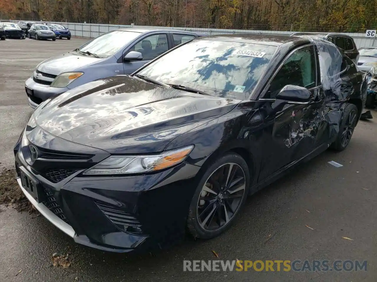 2 Photograph of a damaged car 4T1BZ1HK0KU031296 TOYOTA CAMRY 2019