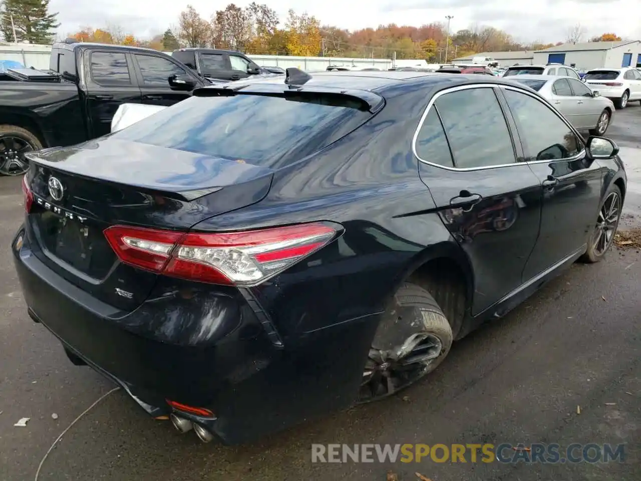 4 Photograph of a damaged car 4T1BZ1HK0KU031296 TOYOTA CAMRY 2019