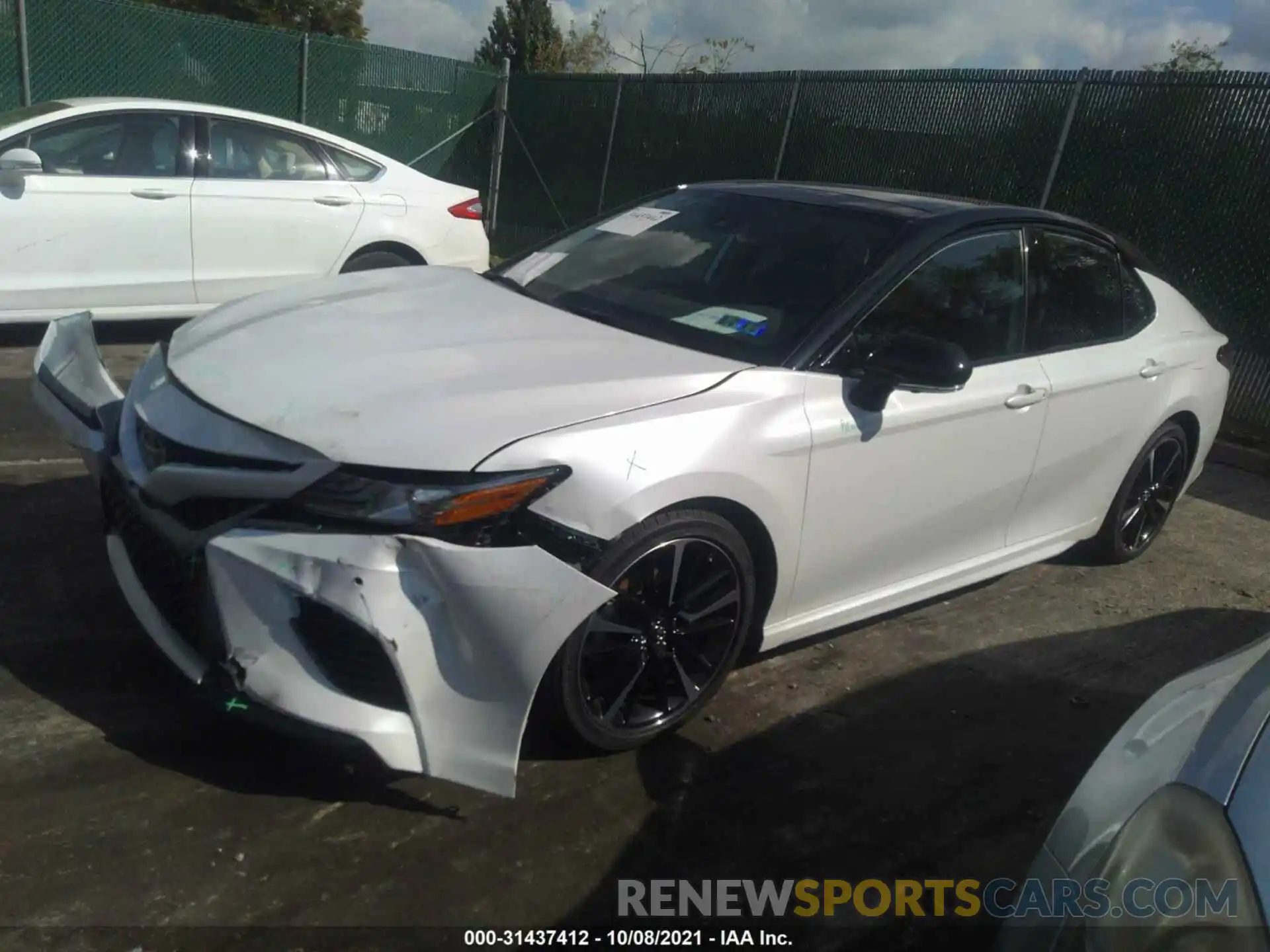 2 Photograph of a damaged car 4T1BZ1HK0KU031458 TOYOTA CAMRY 2019