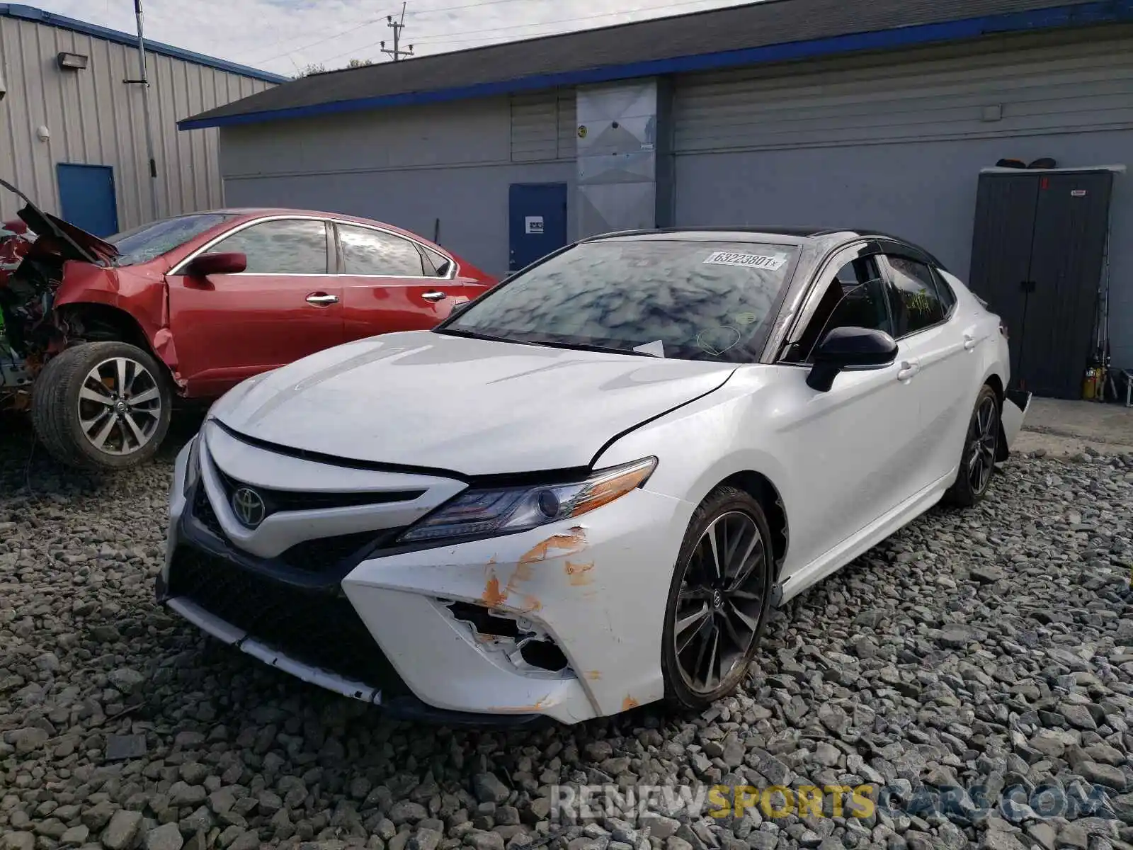 2 Photograph of a damaged car 4T1BZ1HK0KU031878 TOYOTA CAMRY 2019