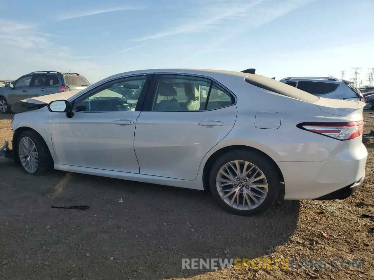 2 Photograph of a damaged car 4T1BZ1HK1KU025703 TOYOTA CAMRY 2019