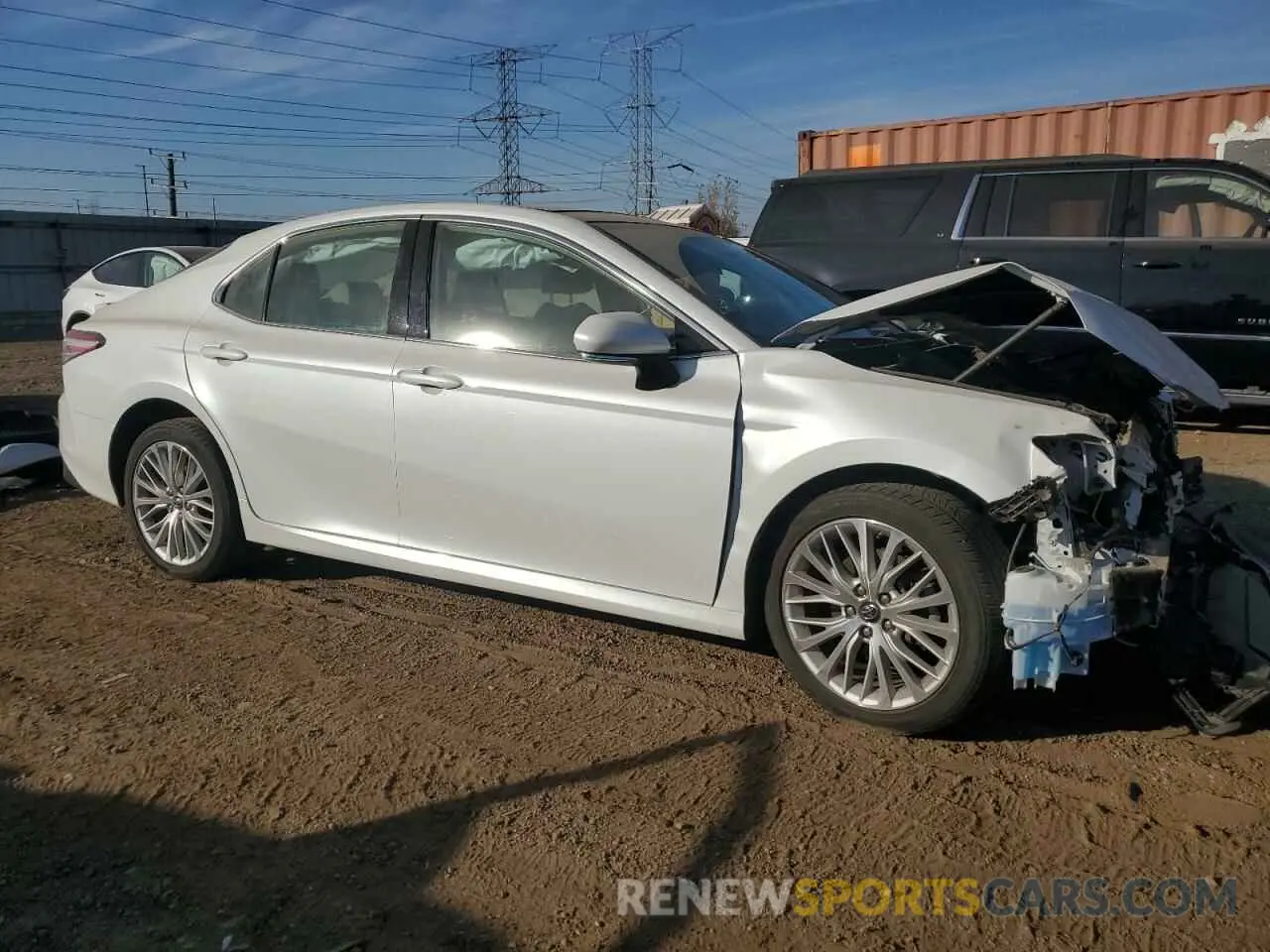 4 Photograph of a damaged car 4T1BZ1HK1KU025703 TOYOTA CAMRY 2019