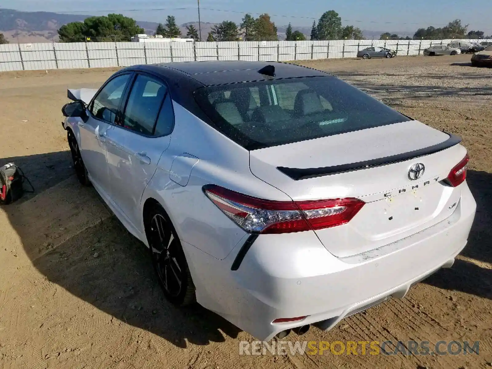 3 Photograph of a damaged car 4T1BZ1HK1KU025877 TOYOTA CAMRY 2019