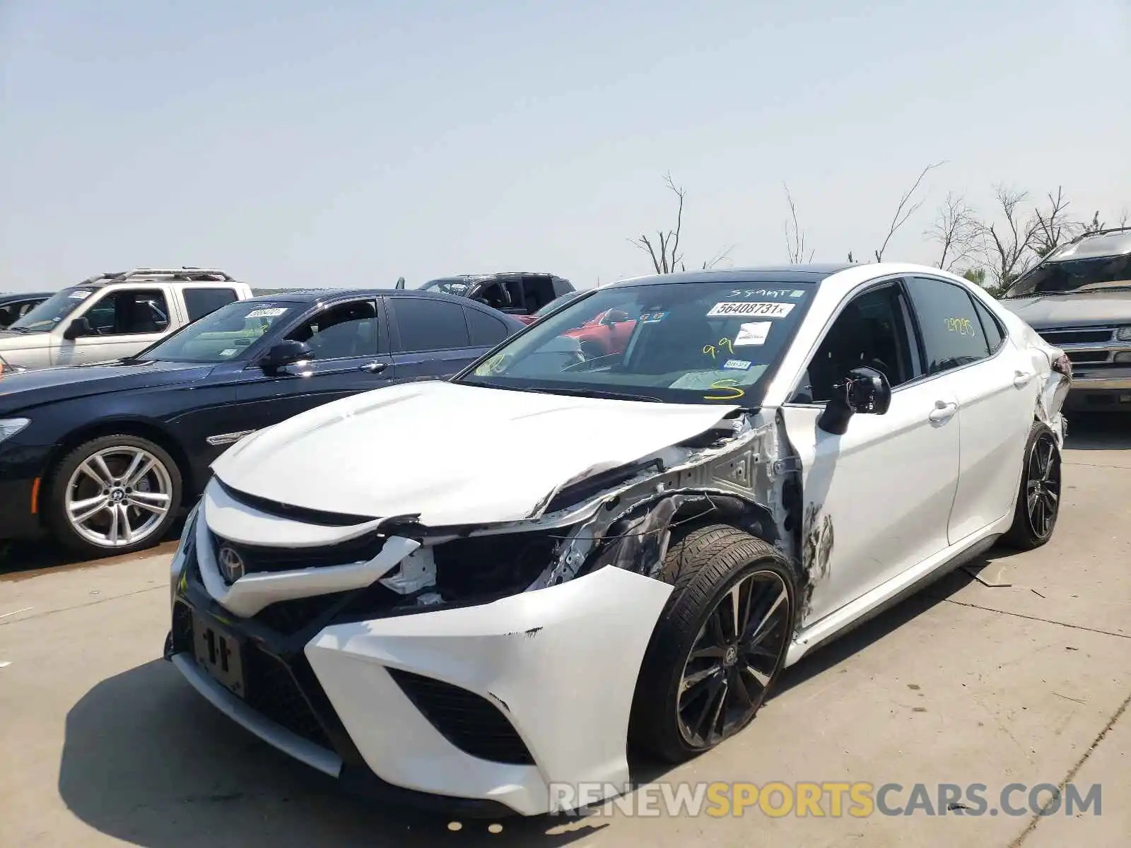 2 Photograph of a damaged car 4T1BZ1HK1KU029315 TOYOTA CAMRY 2019