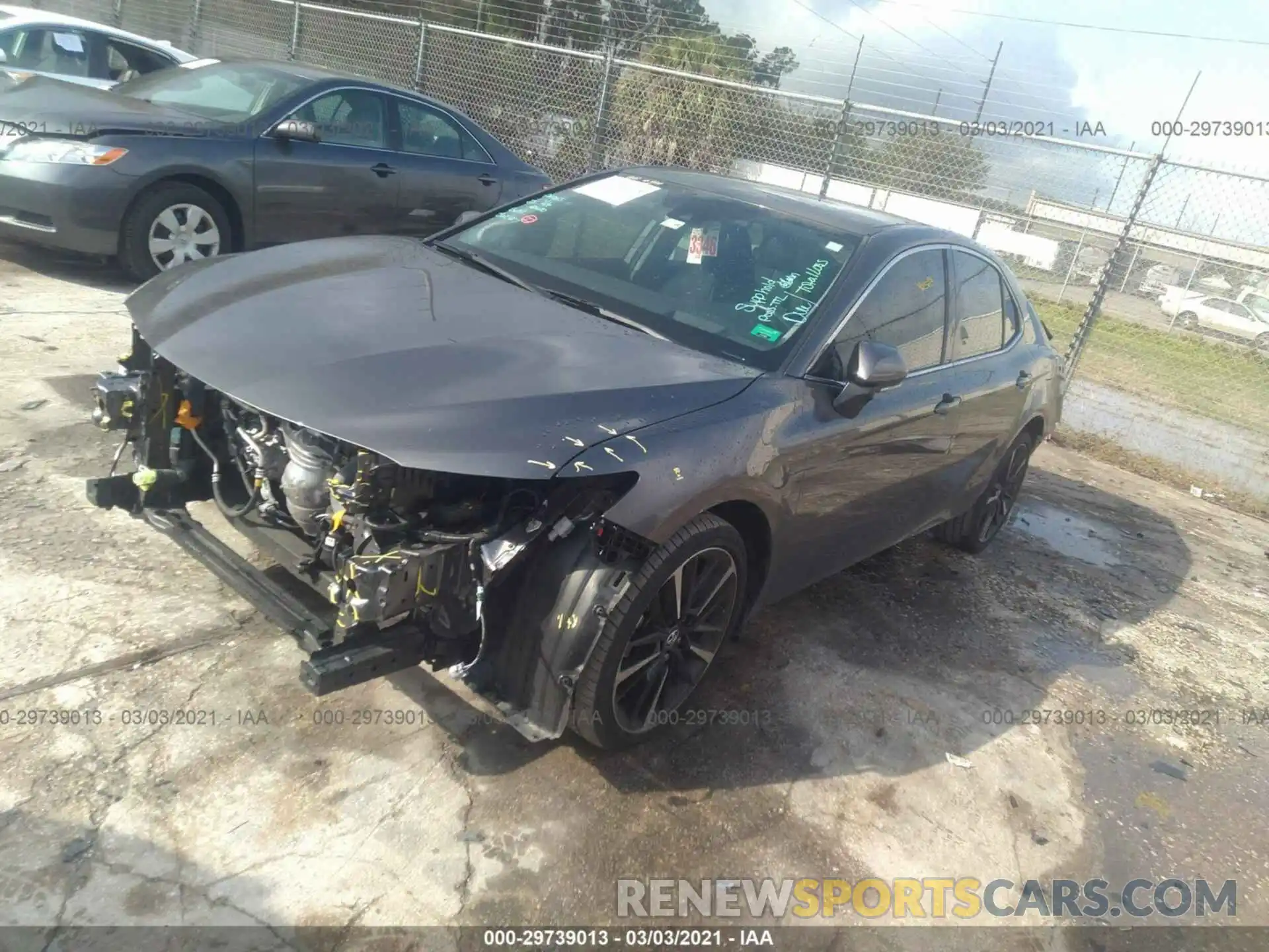 2 Photograph of a damaged car 4T1BZ1HK1KU031887 TOYOTA CAMRY 2019