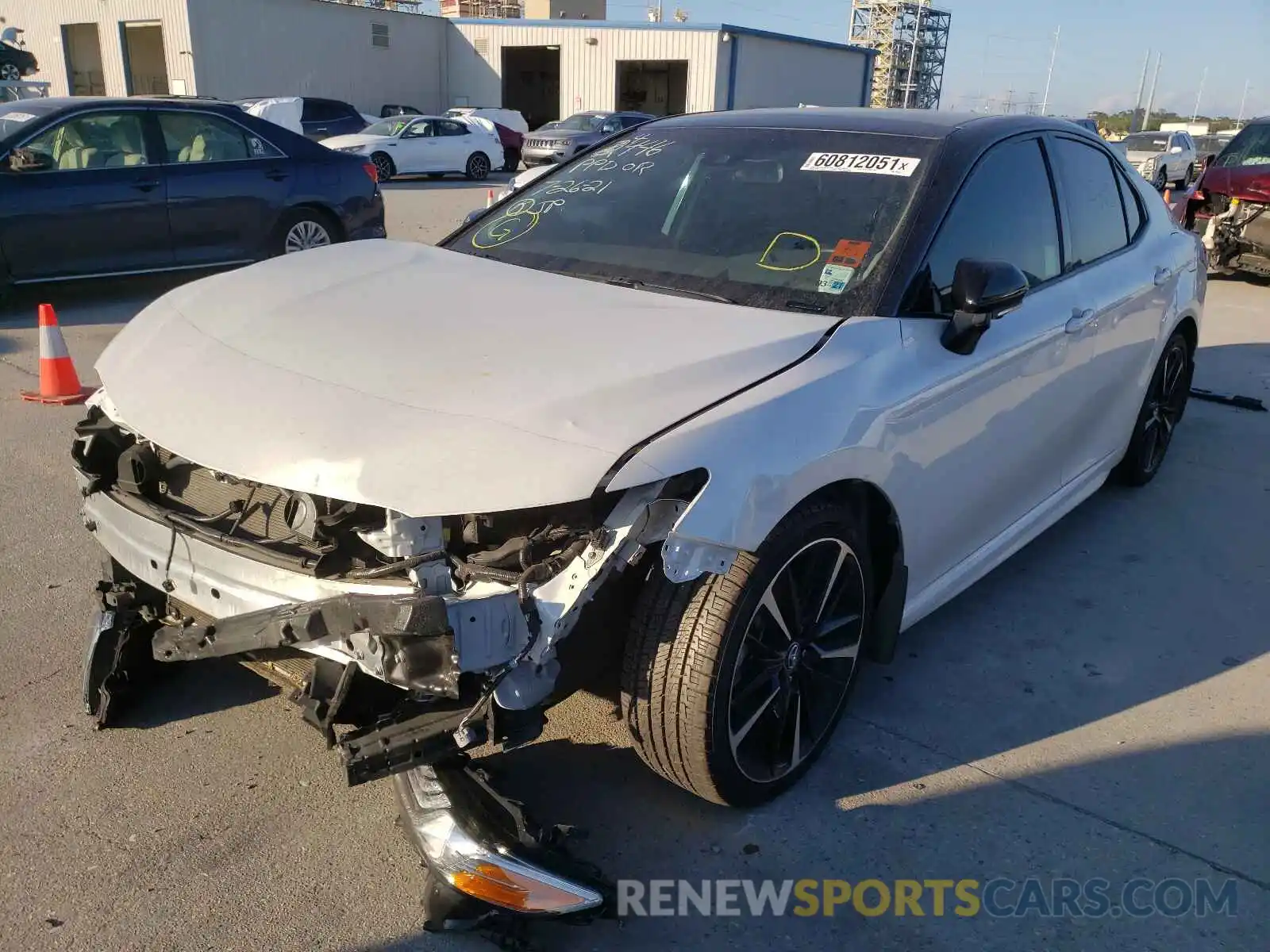 2 Photograph of a damaged car 4T1BZ1HK2KU024446 TOYOTA CAMRY 2019