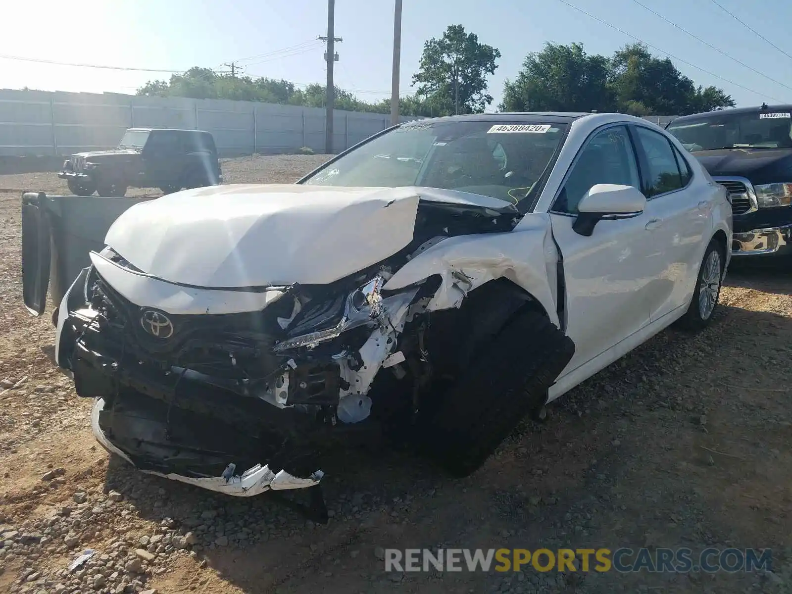 2 Photograph of a damaged car 4T1BZ1HK2KU029839 TOYOTA CAMRY 2019