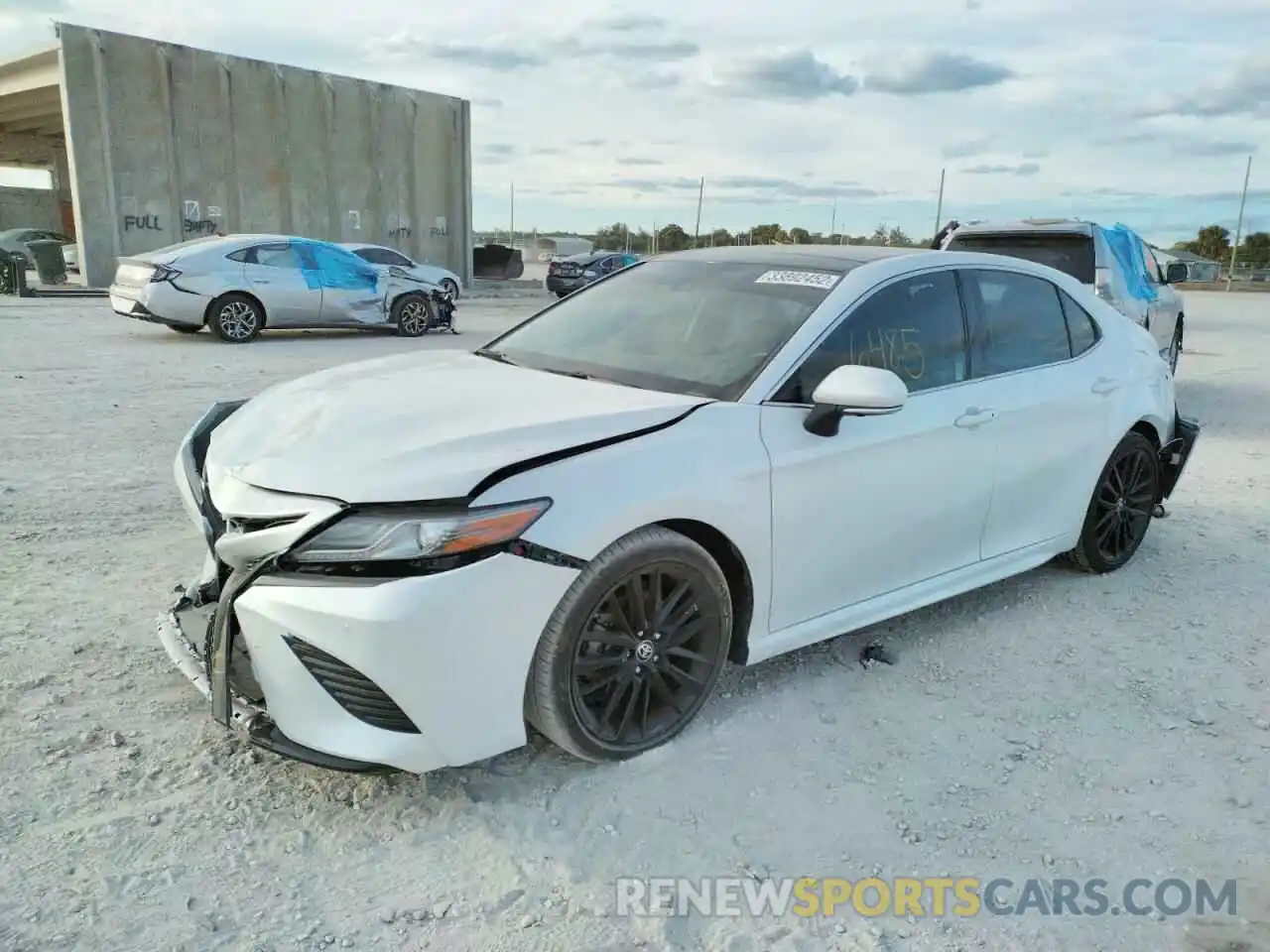 2 Photograph of a damaged car 4T1BZ1HK2KU031011 TOYOTA CAMRY 2019