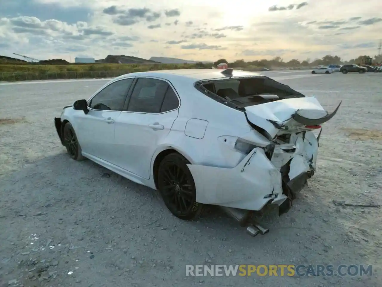 3 Photograph of a damaged car 4T1BZ1HK2KU031011 TOYOTA CAMRY 2019