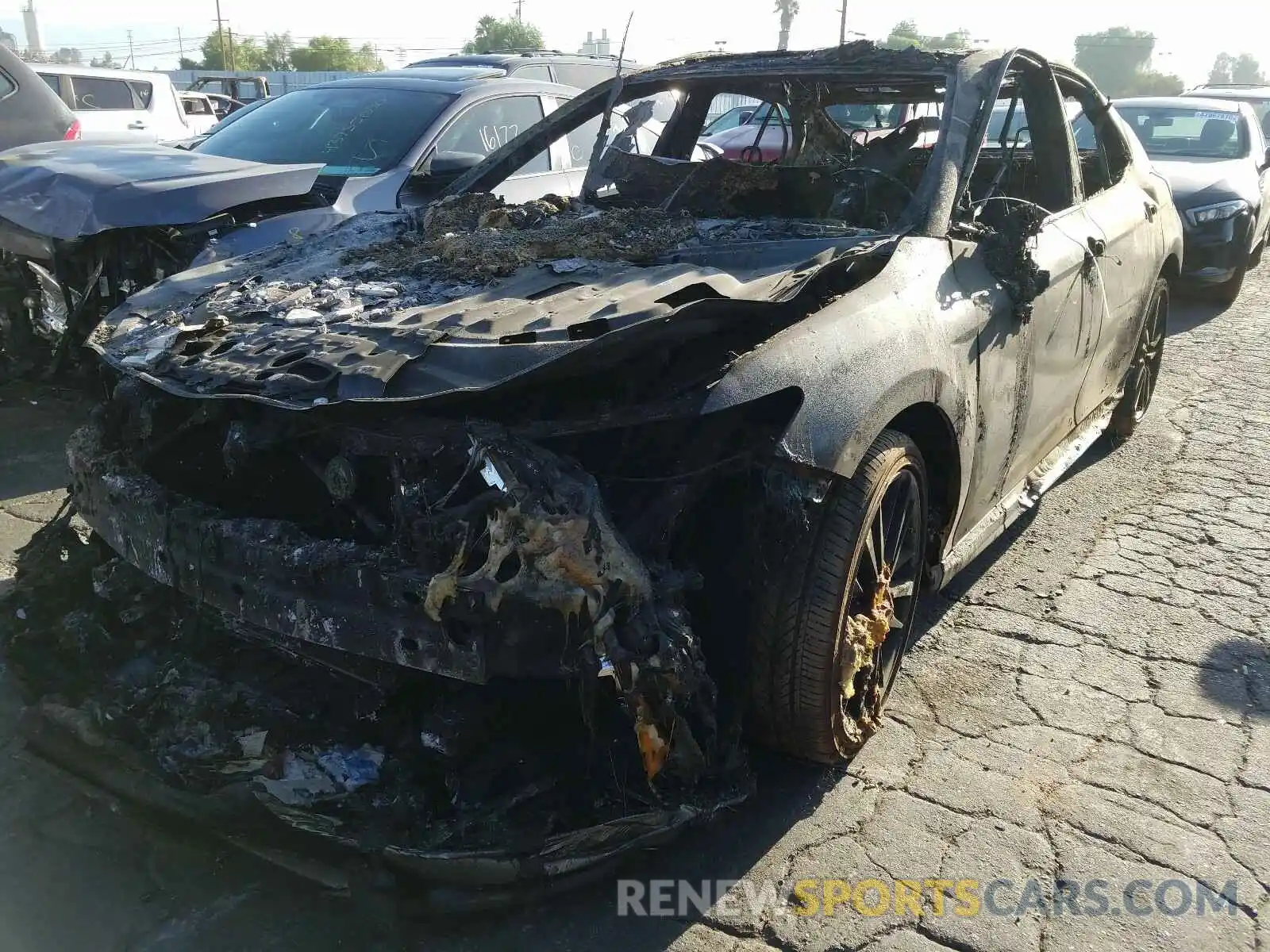 2 Photograph of a damaged car 4T1BZ1HK3KU024763 TOYOTA CAMRY 2019