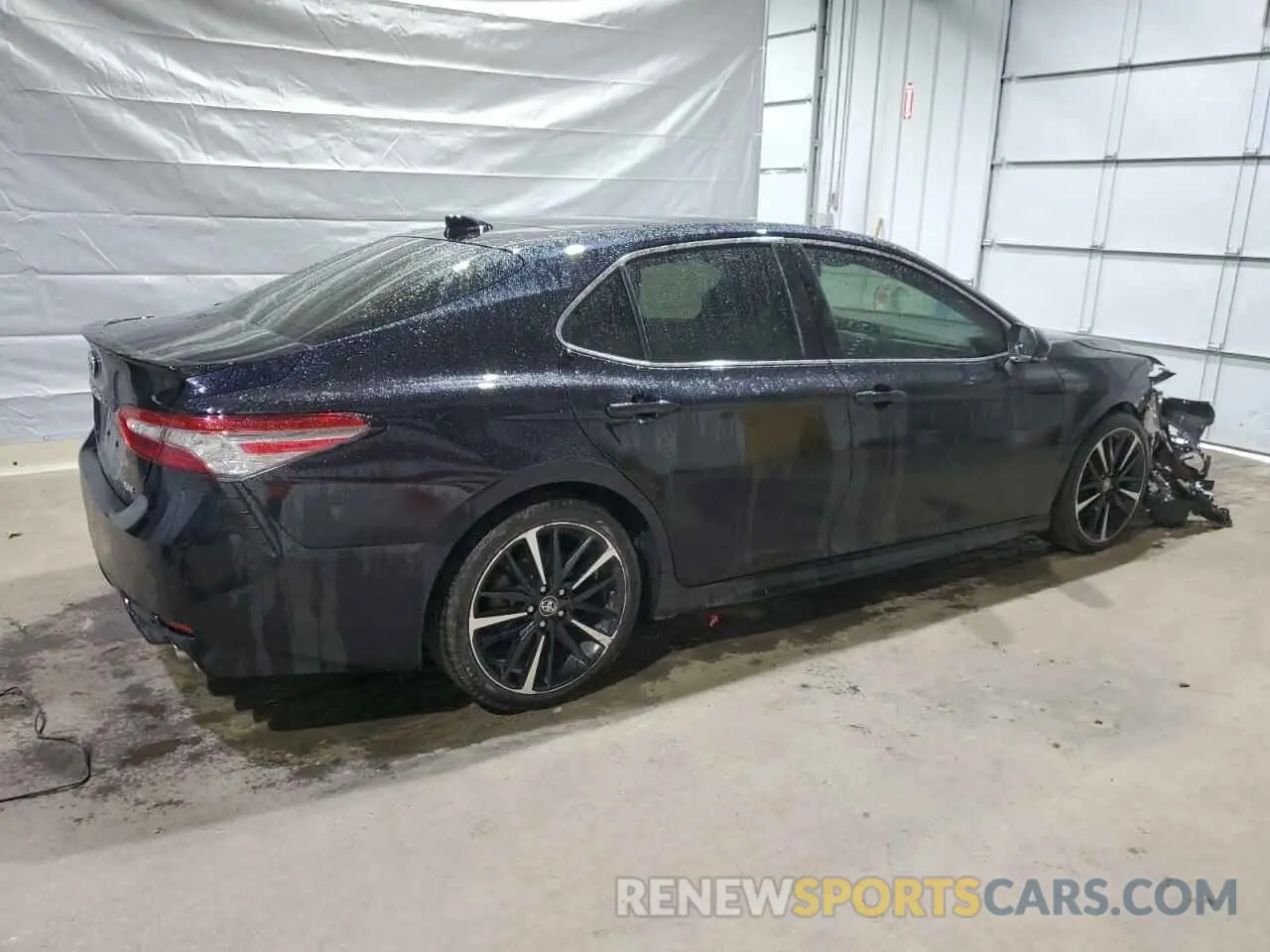 3 Photograph of a damaged car 4T1BZ1HK3KU026903 TOYOTA CAMRY 2019