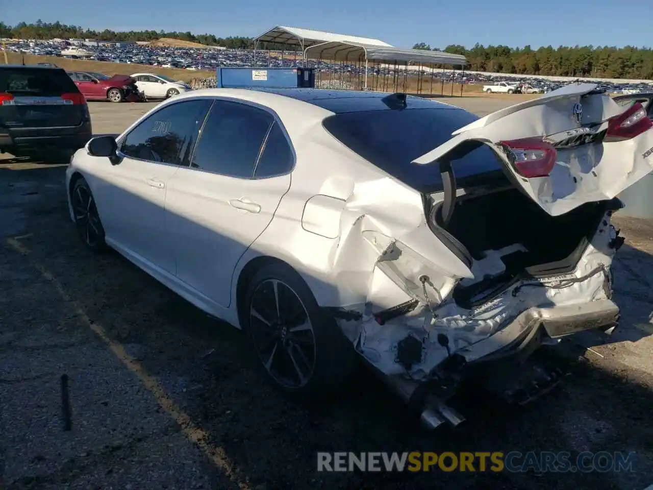 3 Photograph of a damaged car 4T1BZ1HK3KU028523 TOYOTA CAMRY 2019