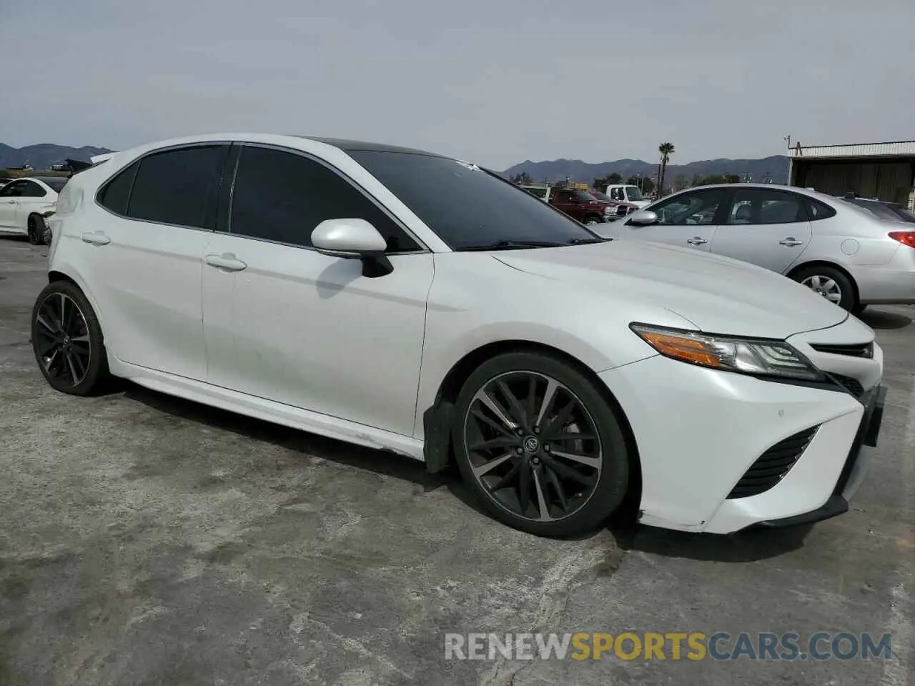 4 Photograph of a damaged car 4T1BZ1HK3KU029574 TOYOTA CAMRY 2019