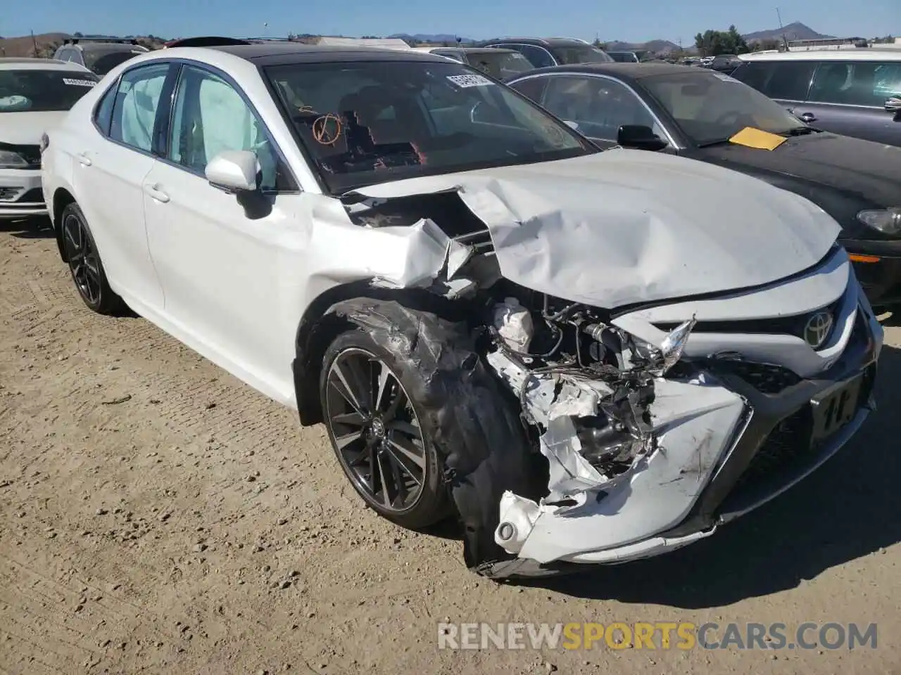 1 Photograph of a damaged car 4T1BZ1HK4KU507615 TOYOTA CAMRY 2019