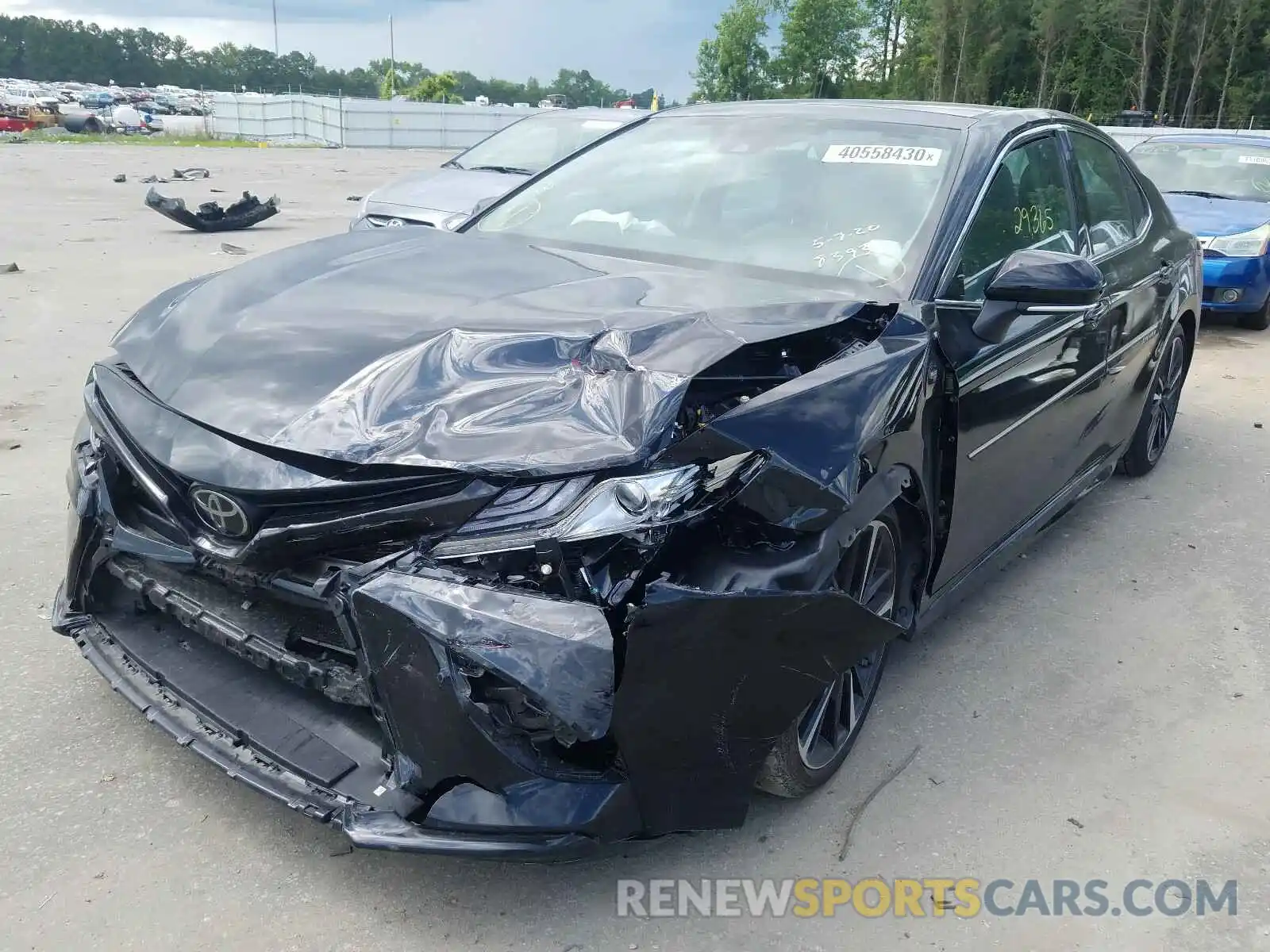 2 Photograph of a damaged car 4T1BZ1HK5KU028393 TOYOTA CAMRY 2019