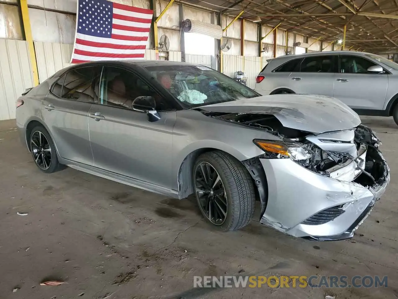 4 Photograph of a damaged car 4T1BZ1HK5KU030144 TOYOTA CAMRY 2019