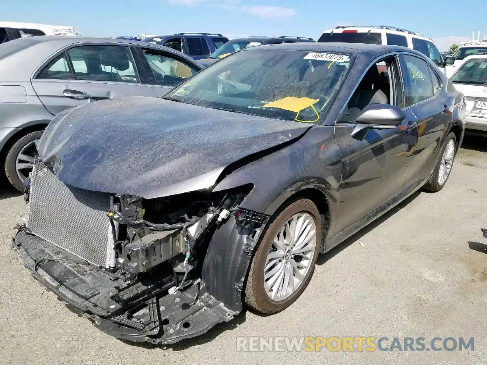 2 Photograph of a damaged car 4T1BZ1HK5KU507512 TOYOTA CAMRY 2019