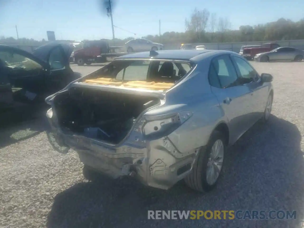 4 Photograph of a damaged car 4T1BZ1HK7KU025558 TOYOTA CAMRY 2019