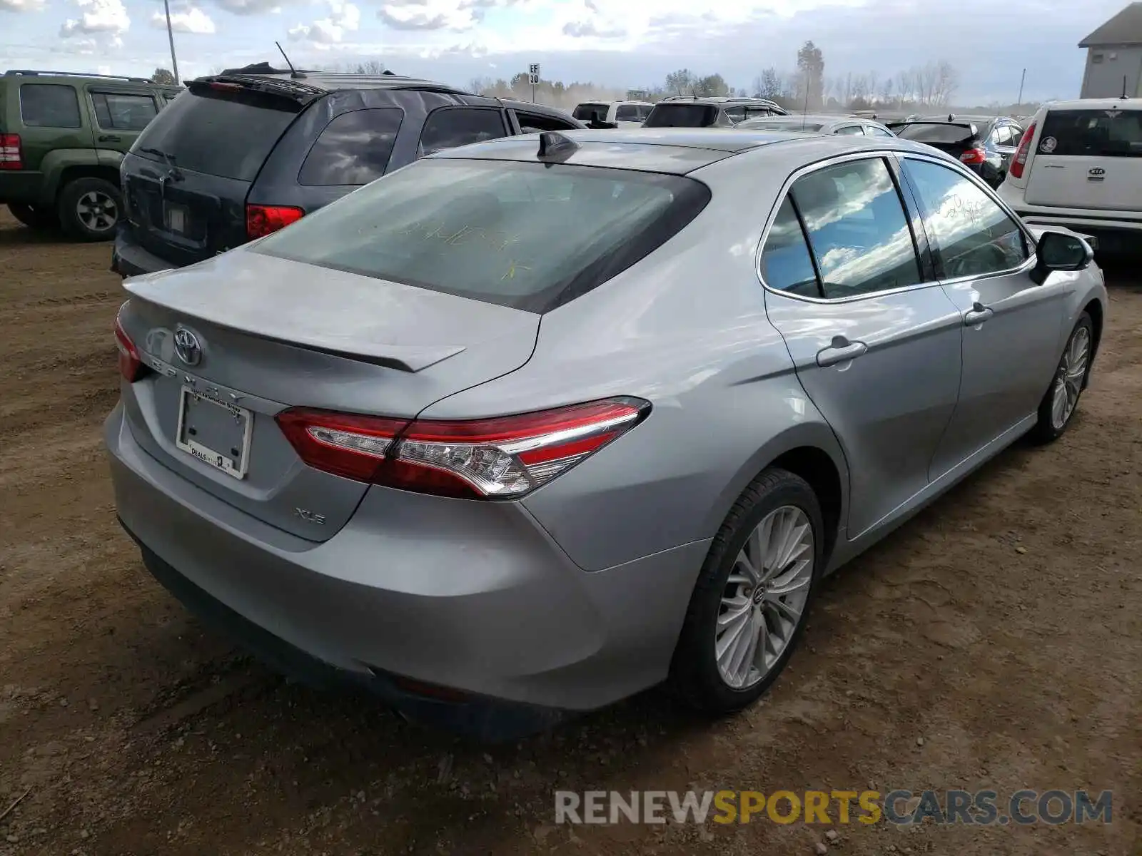 4 Photograph of a damaged car 4T1BZ1HK8KU029439 TOYOTA CAMRY 2019