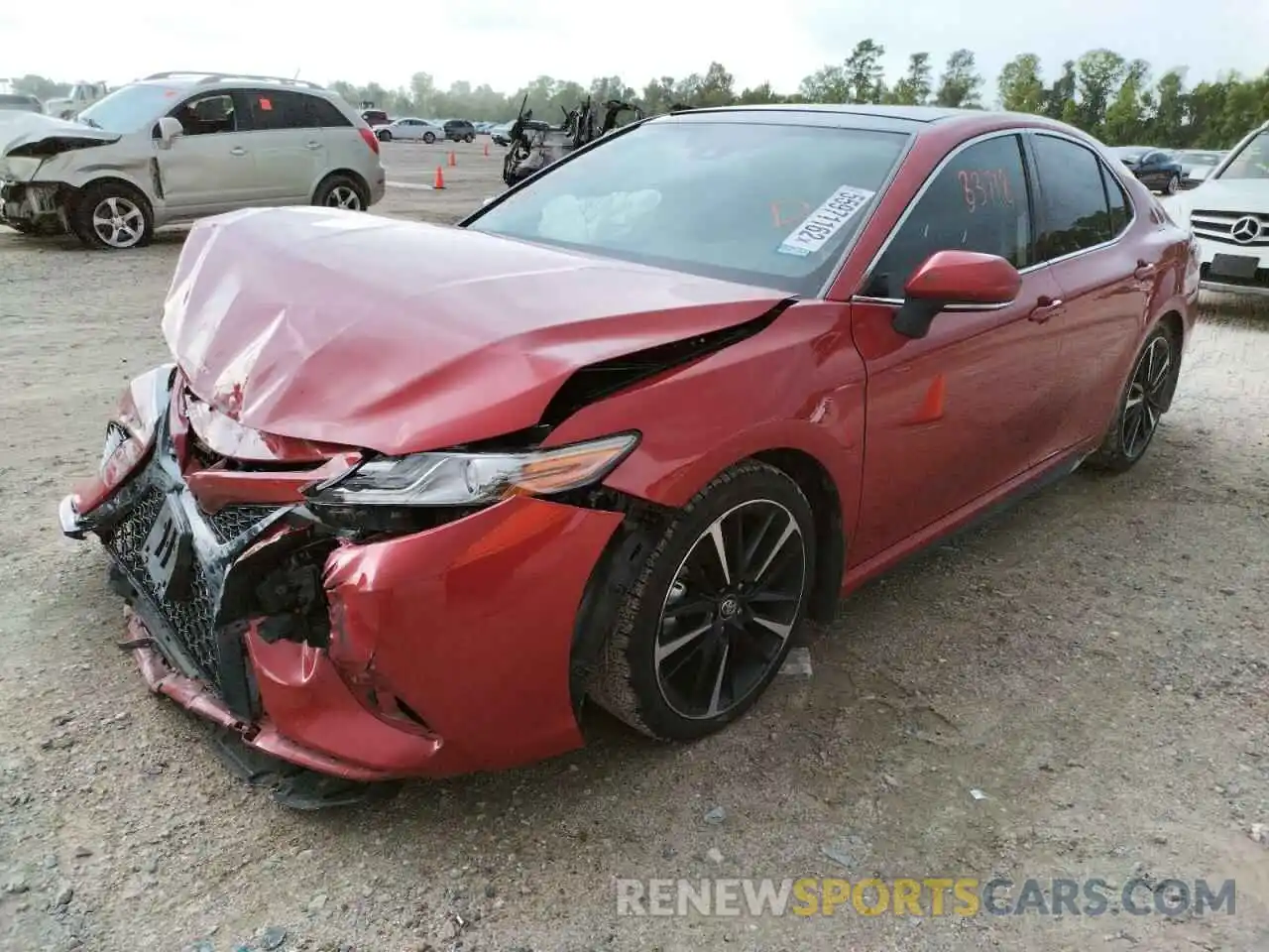 2 Photograph of a damaged car 4T1BZ1HK8KU033135 TOYOTA CAMRY 2019