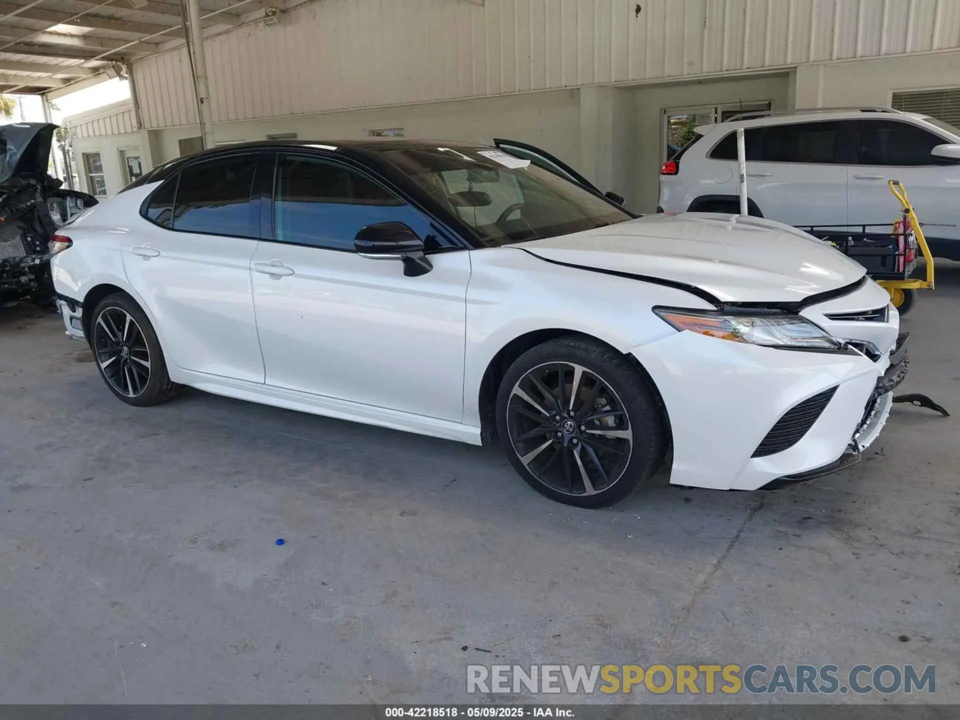 12 Photograph of a damaged car 4T1BZ1HK9KU023858 TOYOTA CAMRY 2019