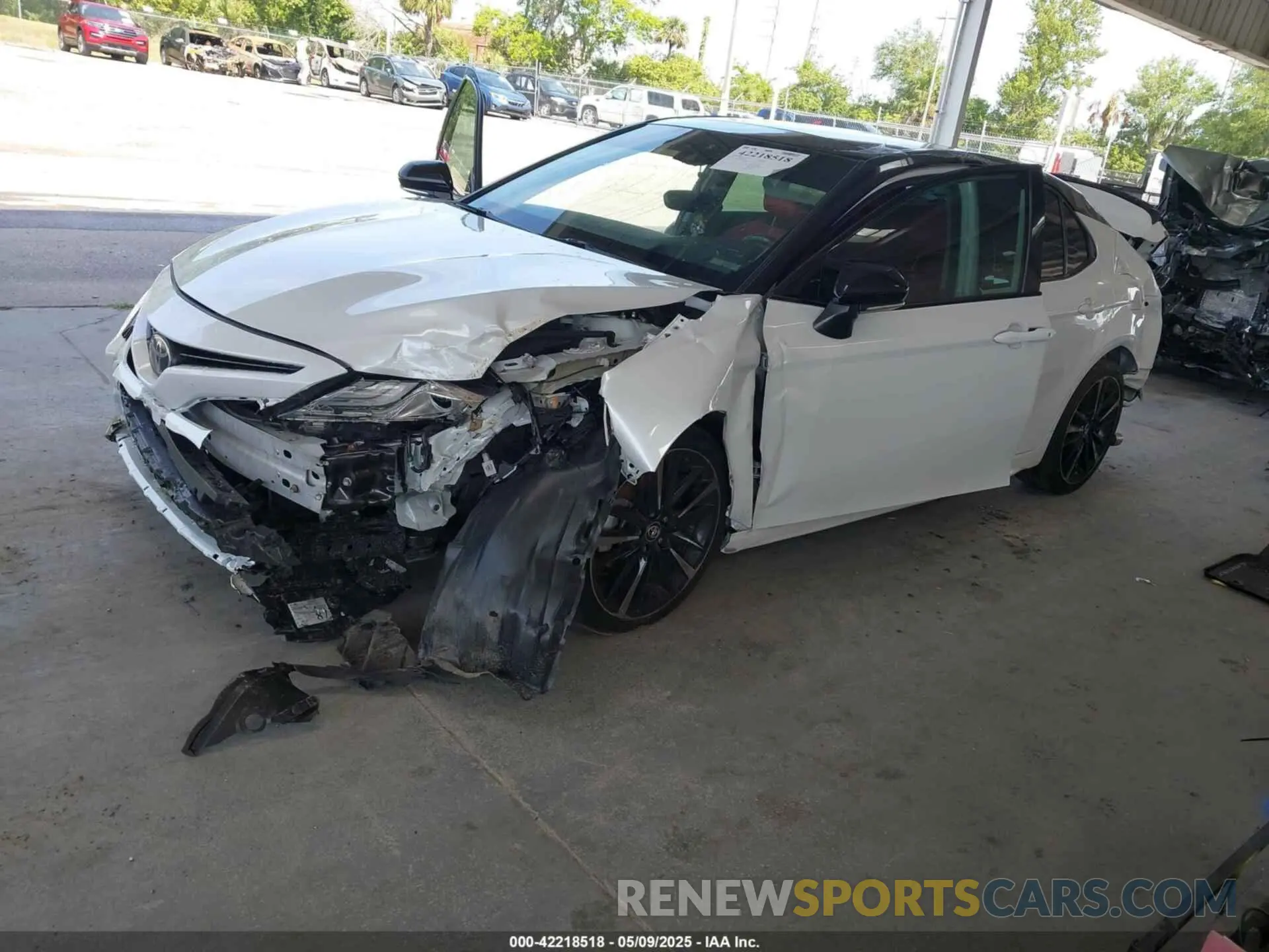 2 Photograph of a damaged car 4T1BZ1HK9KU023858 TOYOTA CAMRY 2019