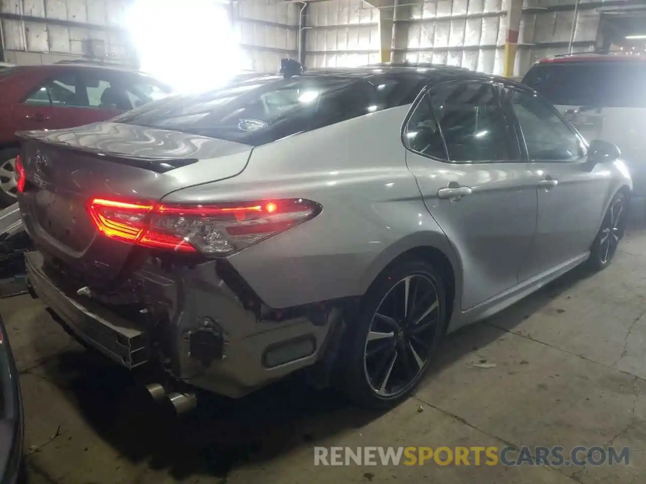 4 Photograph of a damaged car 4T1BZ1HK9KU025934 TOYOTA CAMRY 2019