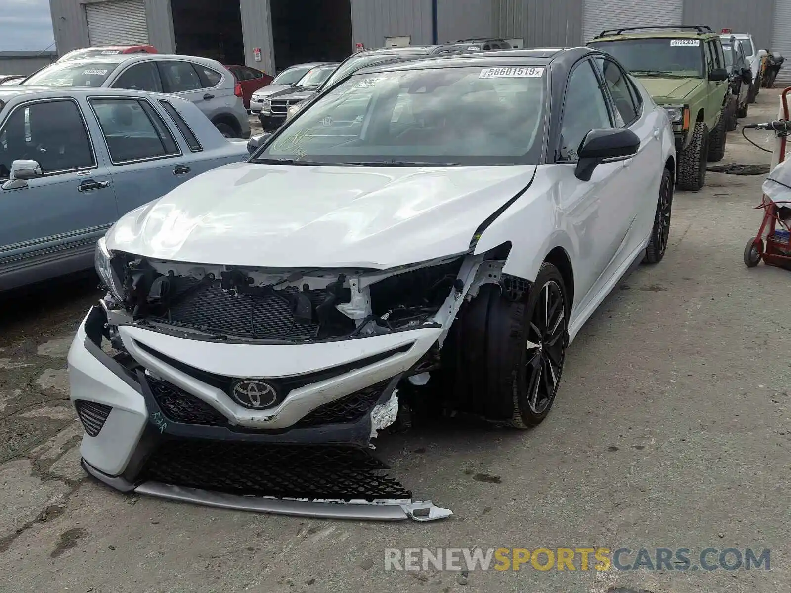 2 Photograph of a damaged car 4T1BZ1HK9KU027750 TOYOTA CAMRY 2019