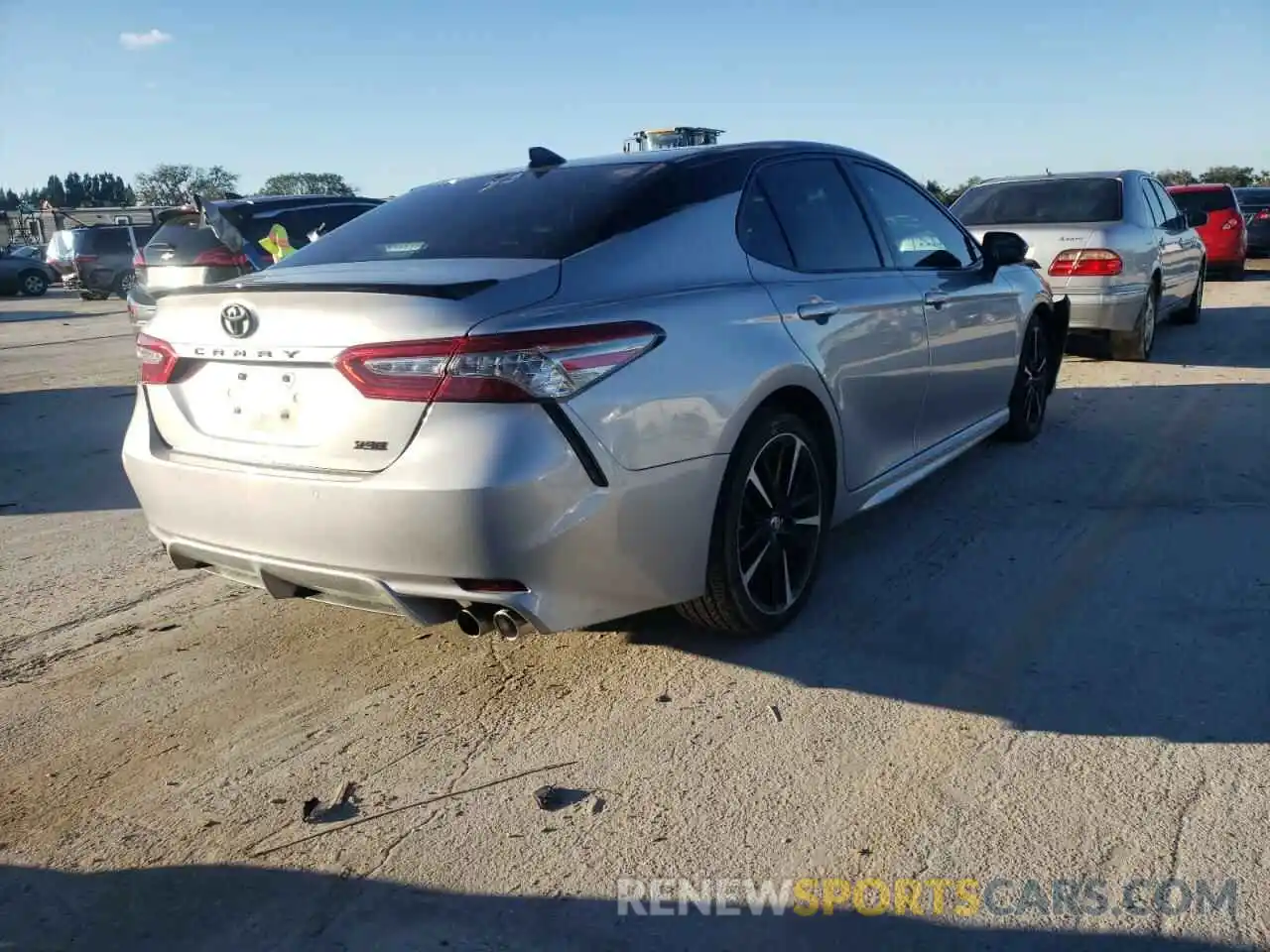 4 Photograph of a damaged car 4T1BZ1HKXKU022573 TOYOTA CAMRY 2019