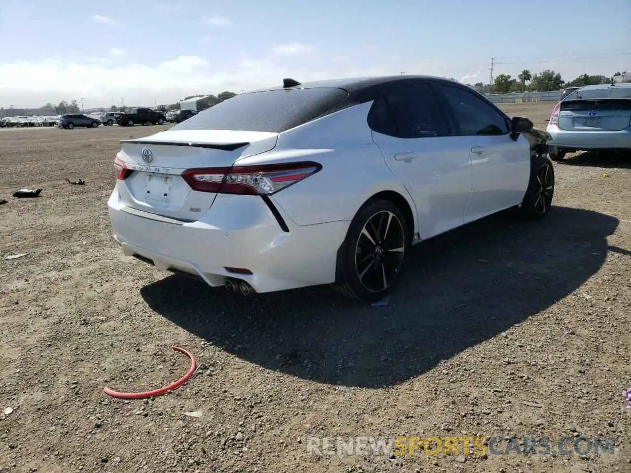 4 Photograph of a damaged car 4T1BZ1HKXKU023545 TOYOTA CAMRY 2019