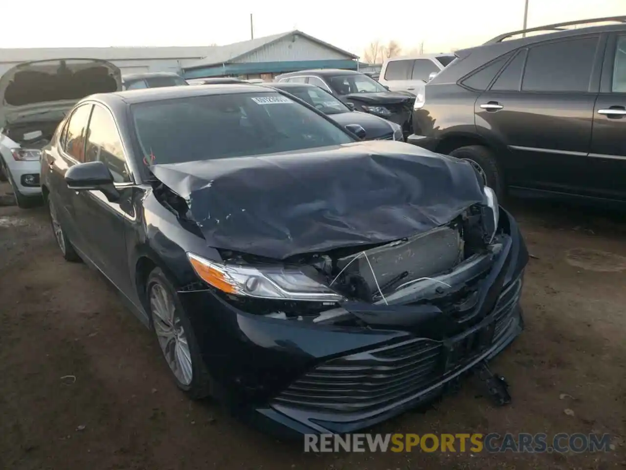 1 Photograph of a damaged car 4T1BZ1HKXKU030396 TOYOTA CAMRY 2019