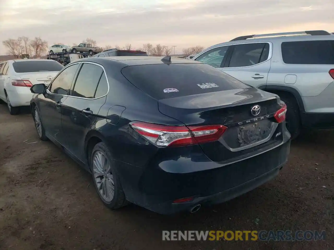 3 Photograph of a damaged car 4T1BZ1HKXKU030396 TOYOTA CAMRY 2019