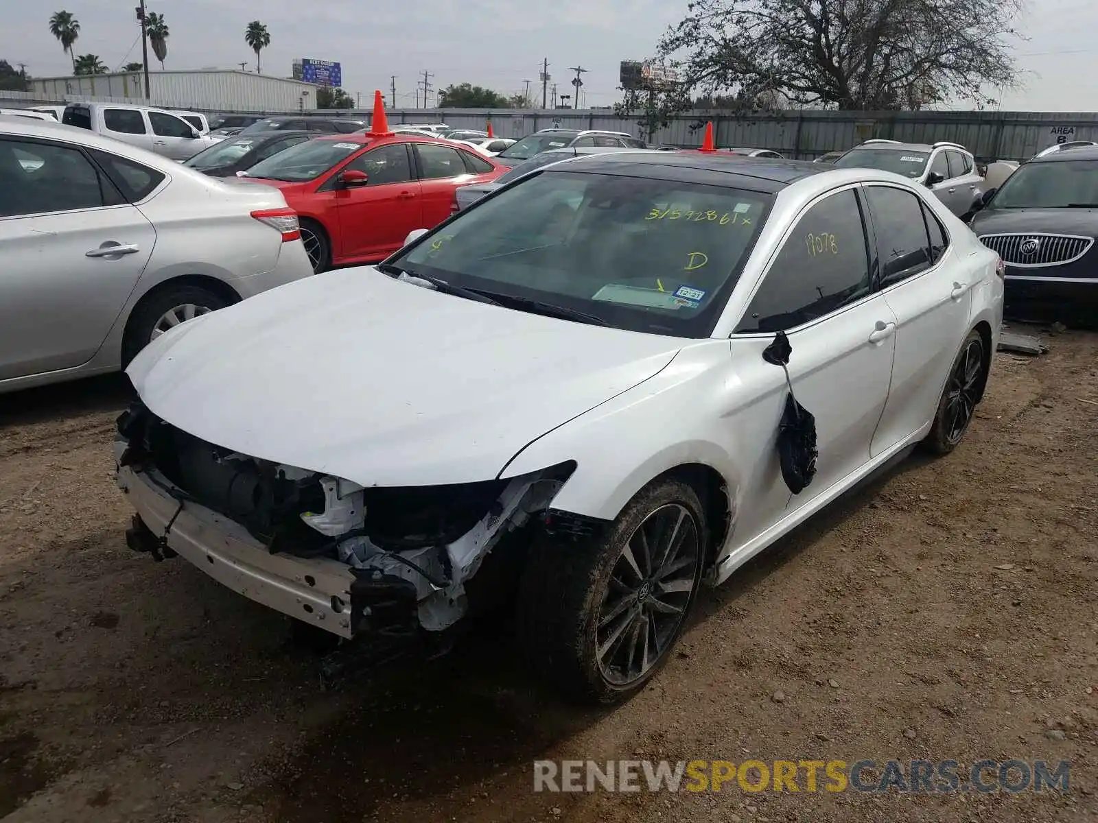 2 Photograph of a damaged car 4T1BZ1HKXKU030771 TOYOTA CAMRY 2019