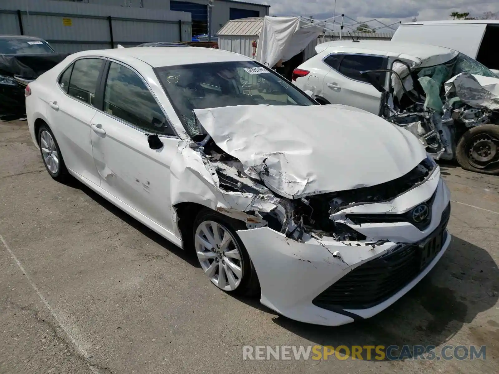 1 Photograph of a damaged car JTNB11HK6K3085246 TOYOTA CAMRY 2019