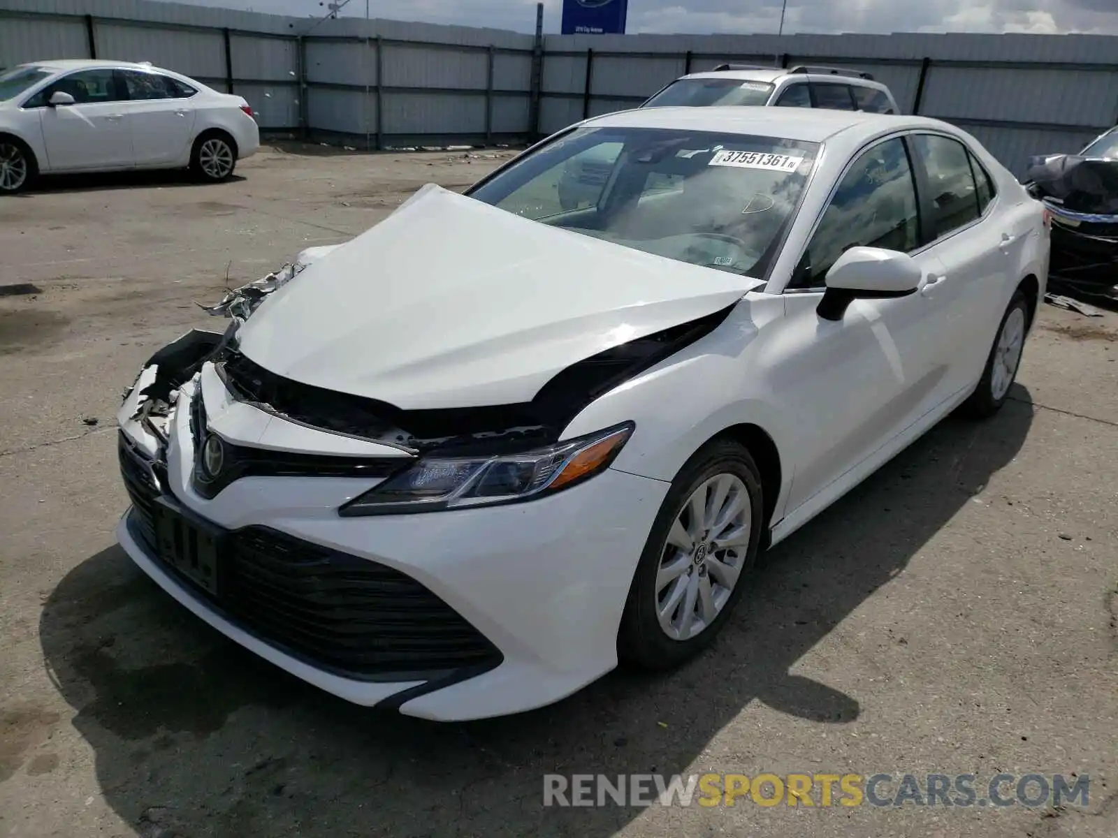 2 Photograph of a damaged car JTNB11HK6K3085246 TOYOTA CAMRY 2019