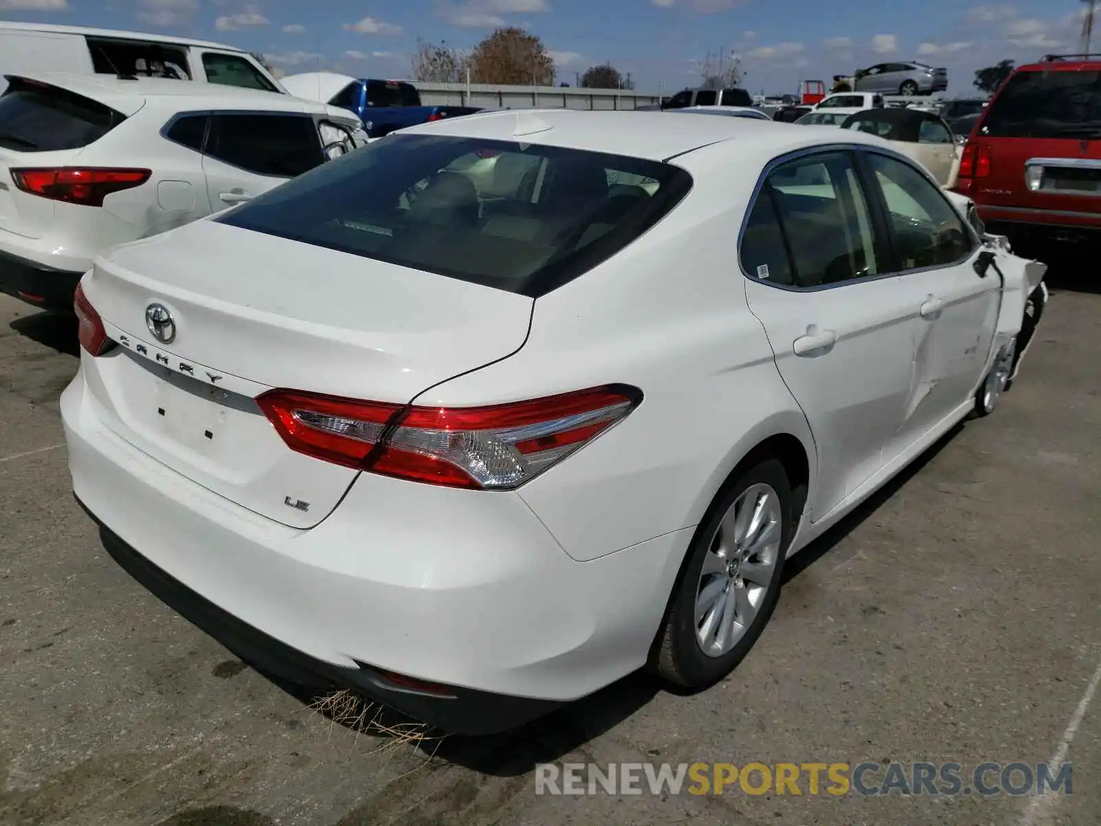 4 Photograph of a damaged car JTNB11HK6K3085246 TOYOTA CAMRY 2019