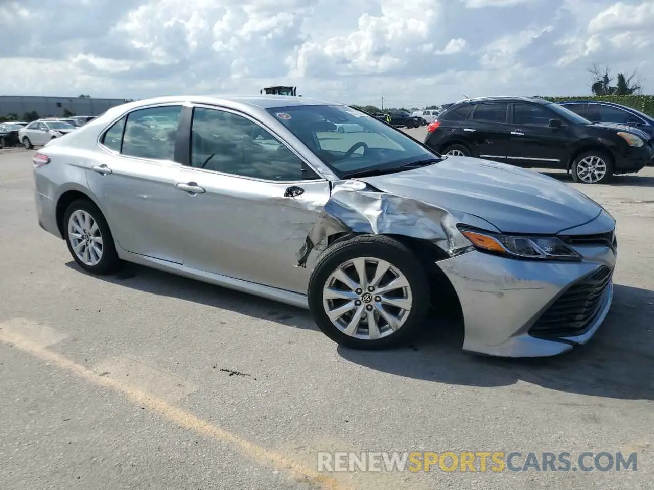 4 Photograph of a damaged car 4T1C11AK2LU999925 TOYOTA CAMRY 2020