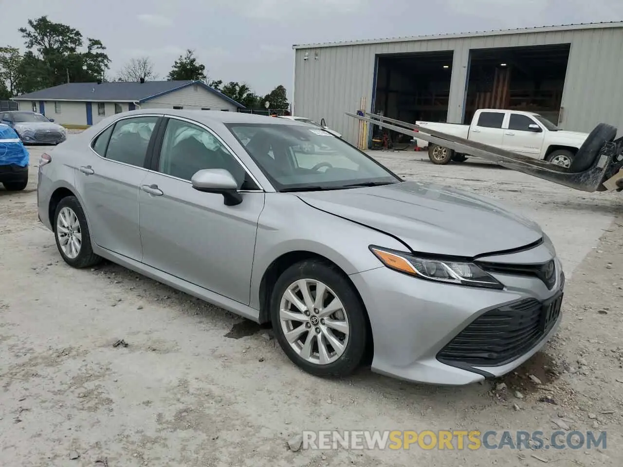 4 Photograph of a damaged car 4T1C11AK3LU394019 TOYOTA CAMRY 2020