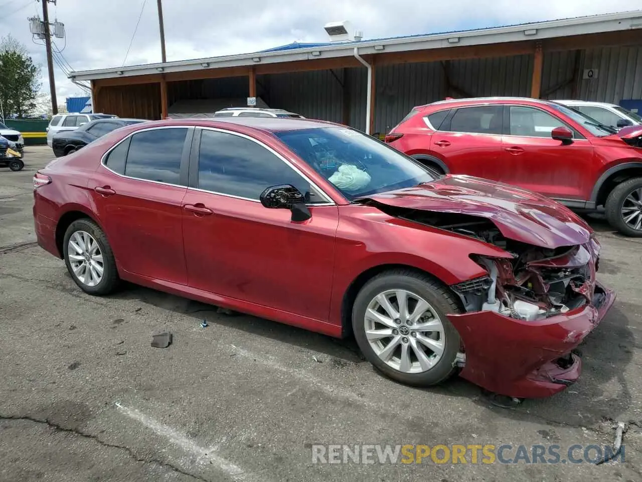 4 Photograph of a damaged car 4T1C11AK3LU997665 TOYOTA CAMRY 2020