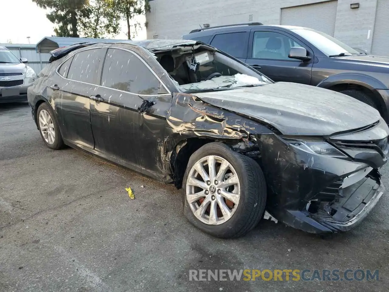 4 Photograph of a damaged car 4T1C11AK5LU913877 TOYOTA CAMRY 2020