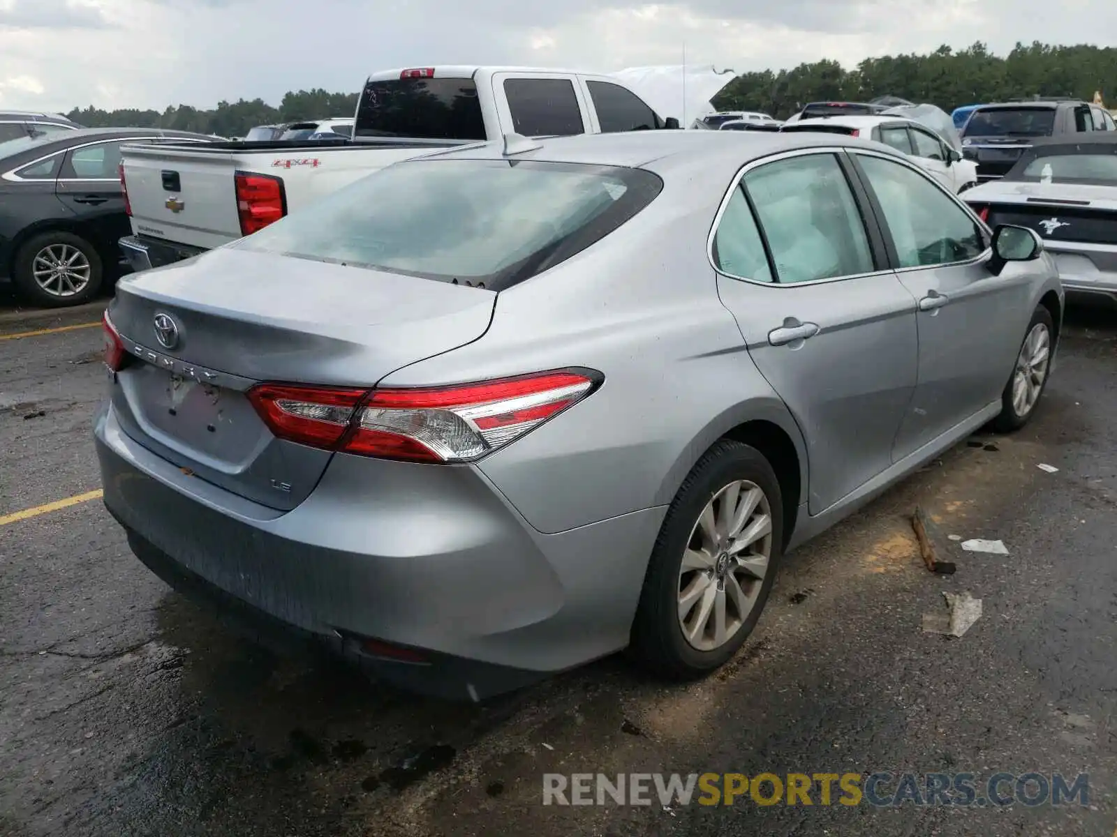 4 Photograph of a damaged car 4T1C11AK6LU857688 TOYOTA CAMRY 2020