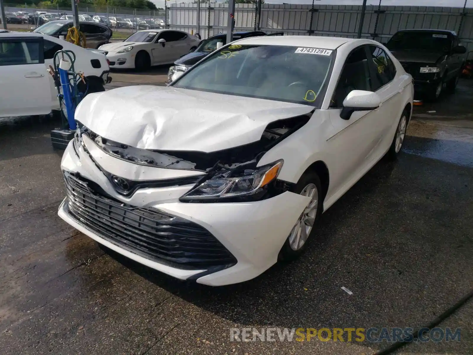 2 Photograph of a damaged car 4T1C11AK7LU997569 TOYOTA CAMRY 2020