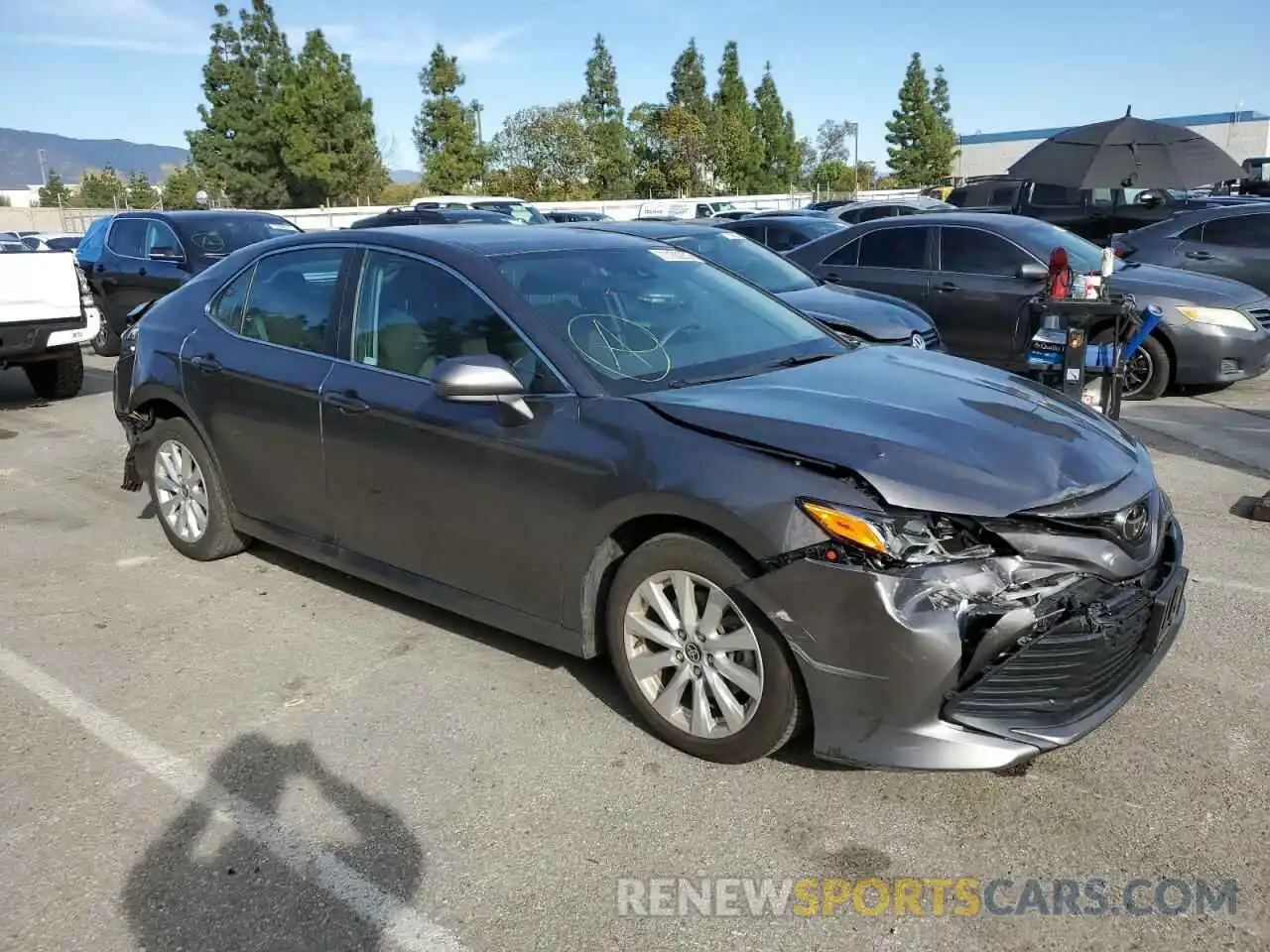 4 Photograph of a damaged car 4T1C11AKXLU995895 TOYOTA CAMRY 2020