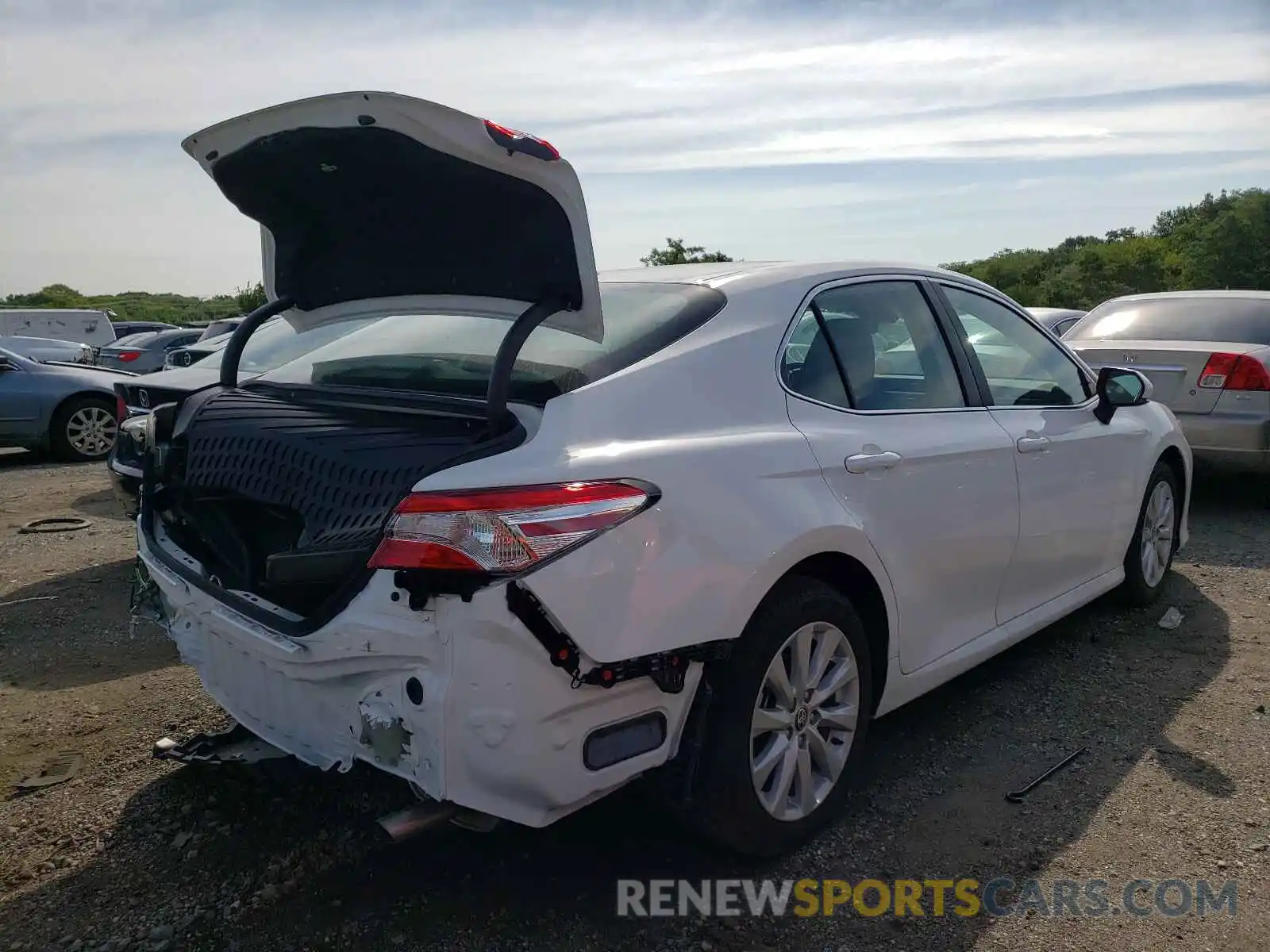 4 Photograph of a damaged car 4T1C11BK7LU011245 TOYOTA CAMRY 2020