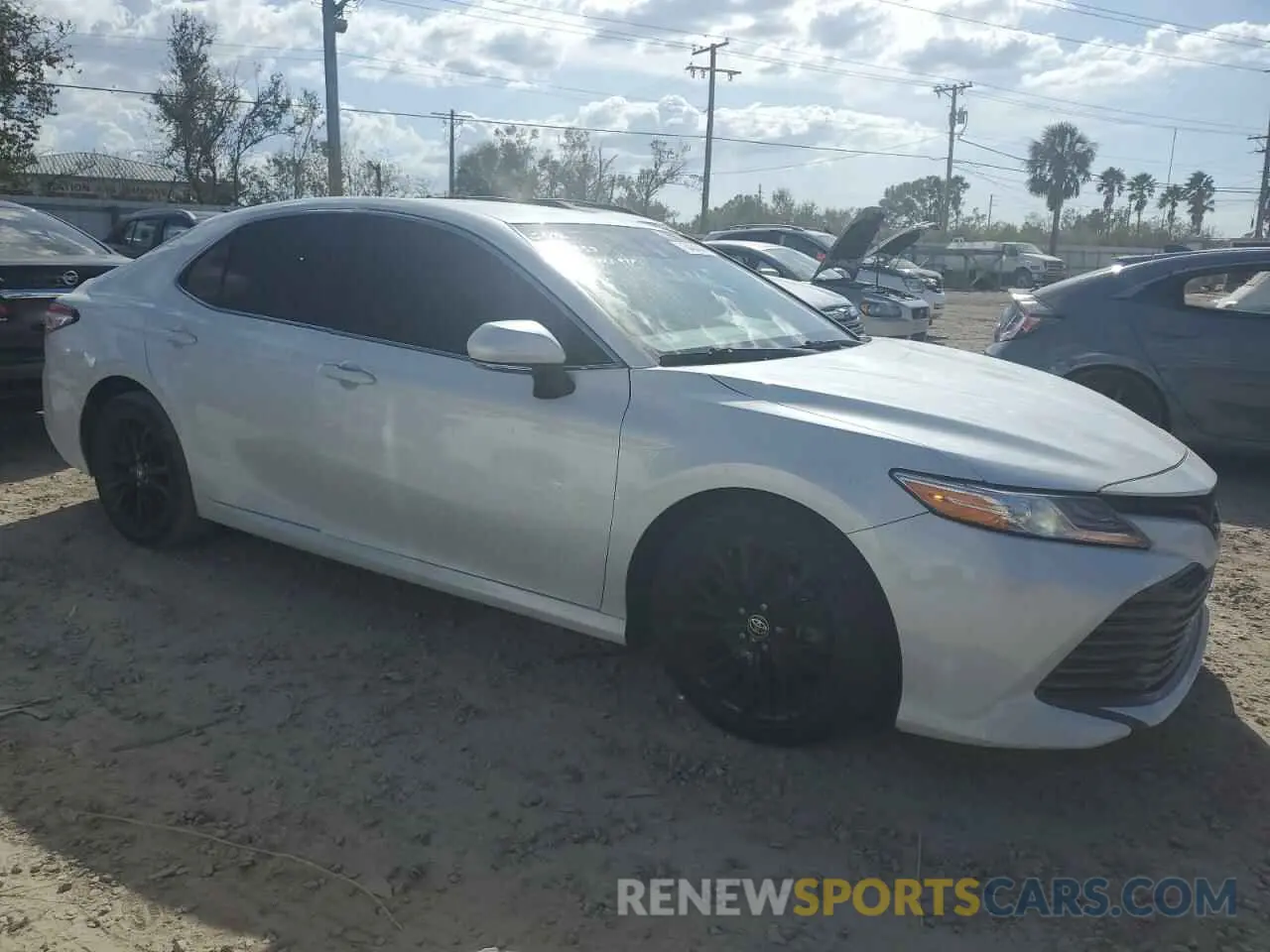 4 Photograph of a damaged car 4T1F11AK6LU980839 TOYOTA CAMRY 2020