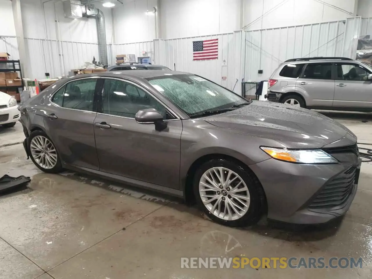 4 Photograph of a damaged car 4T1F11AKXLU863359 TOYOTA CAMRY 2020