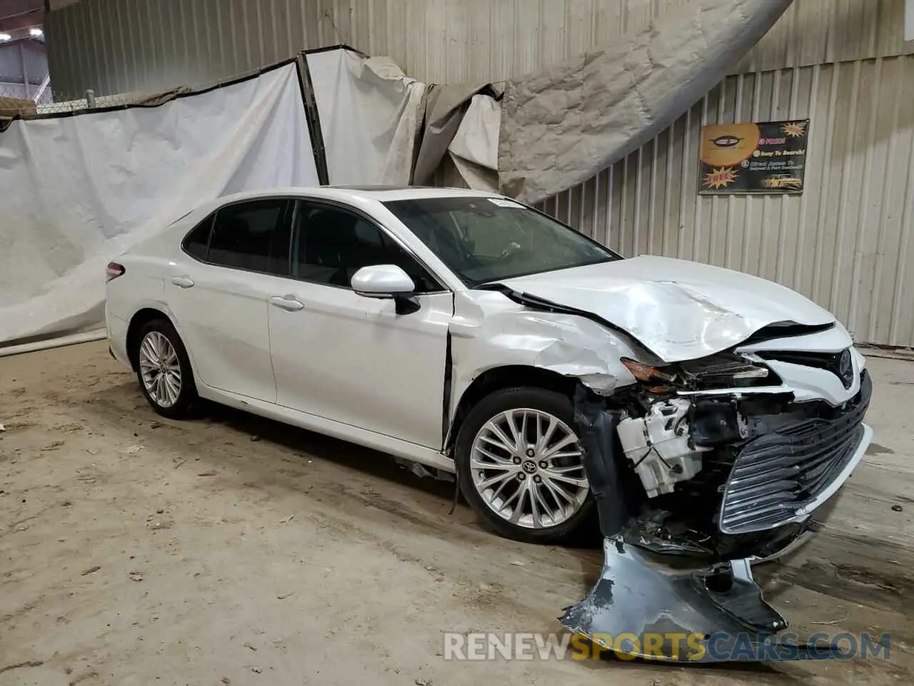 4 Photograph of a damaged car 4T1F31AKXLU533943 TOYOTA CAMRY 2020